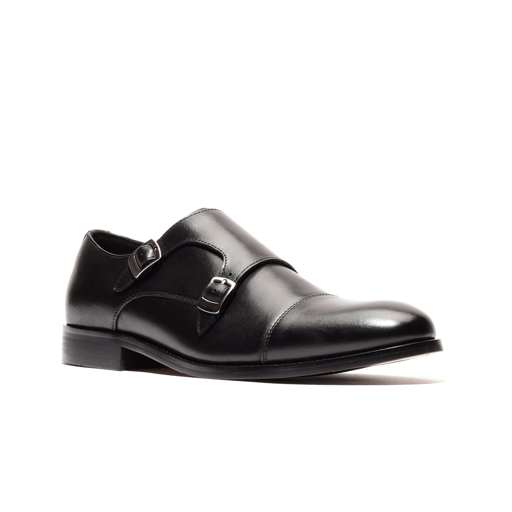 Angled profile of black genuine leather shoes, showcasing their elegant design and premium craftsmanship, ideal for formal occasions and professional settings.