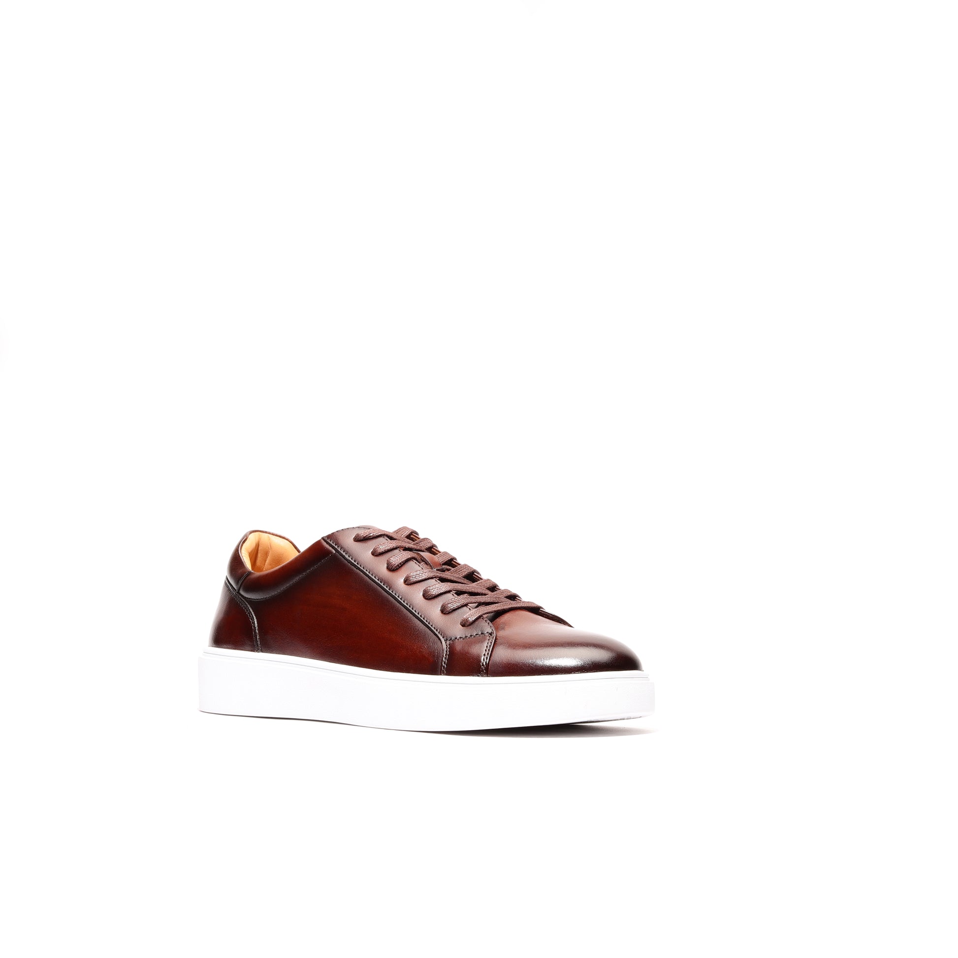 High-quality genuine brown leather sneakers featuring a classic design and comfortable fit.